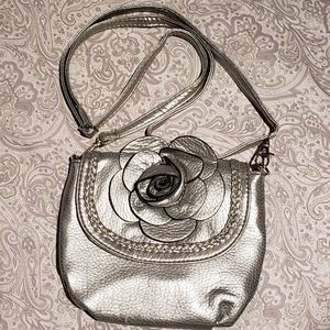Silver color leather purse.